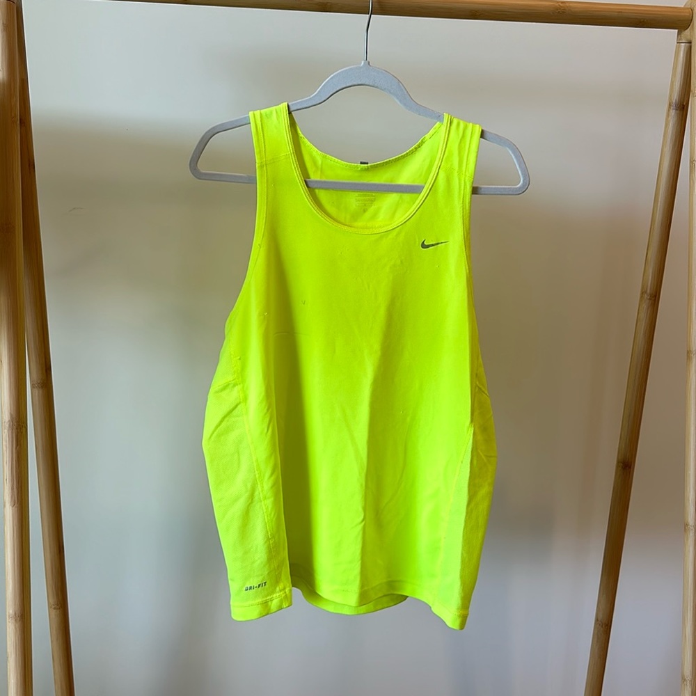 Nike neon yellow men’s dri-fit tank size Large. Few snags, see pics.